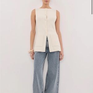 DISSH Sleeveless Cream Button-Up Top